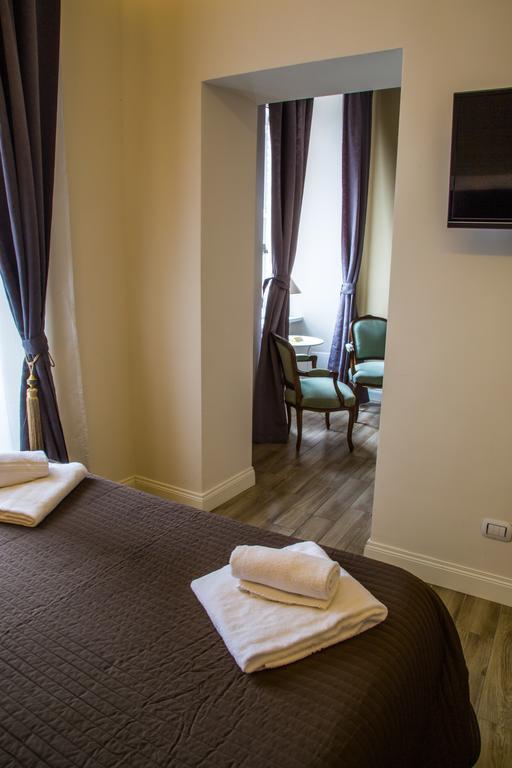 Cavour Forum Suites Roma Camera foto